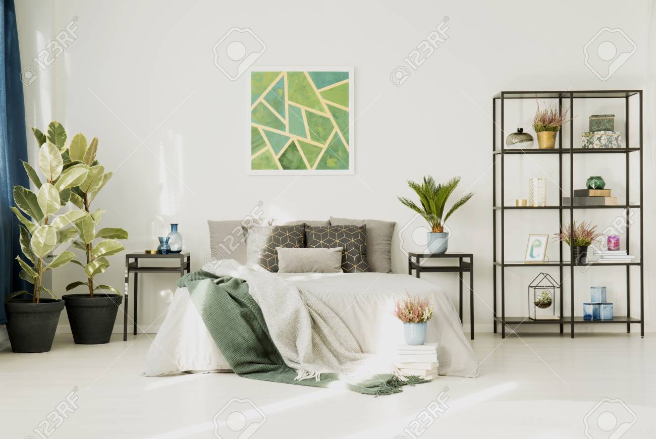 White Bedroom Interior With Green Poster On The Wall Plants