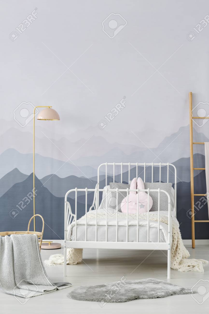 Simple Pastel Pink Lamp Standing In Bright Children Bedroom