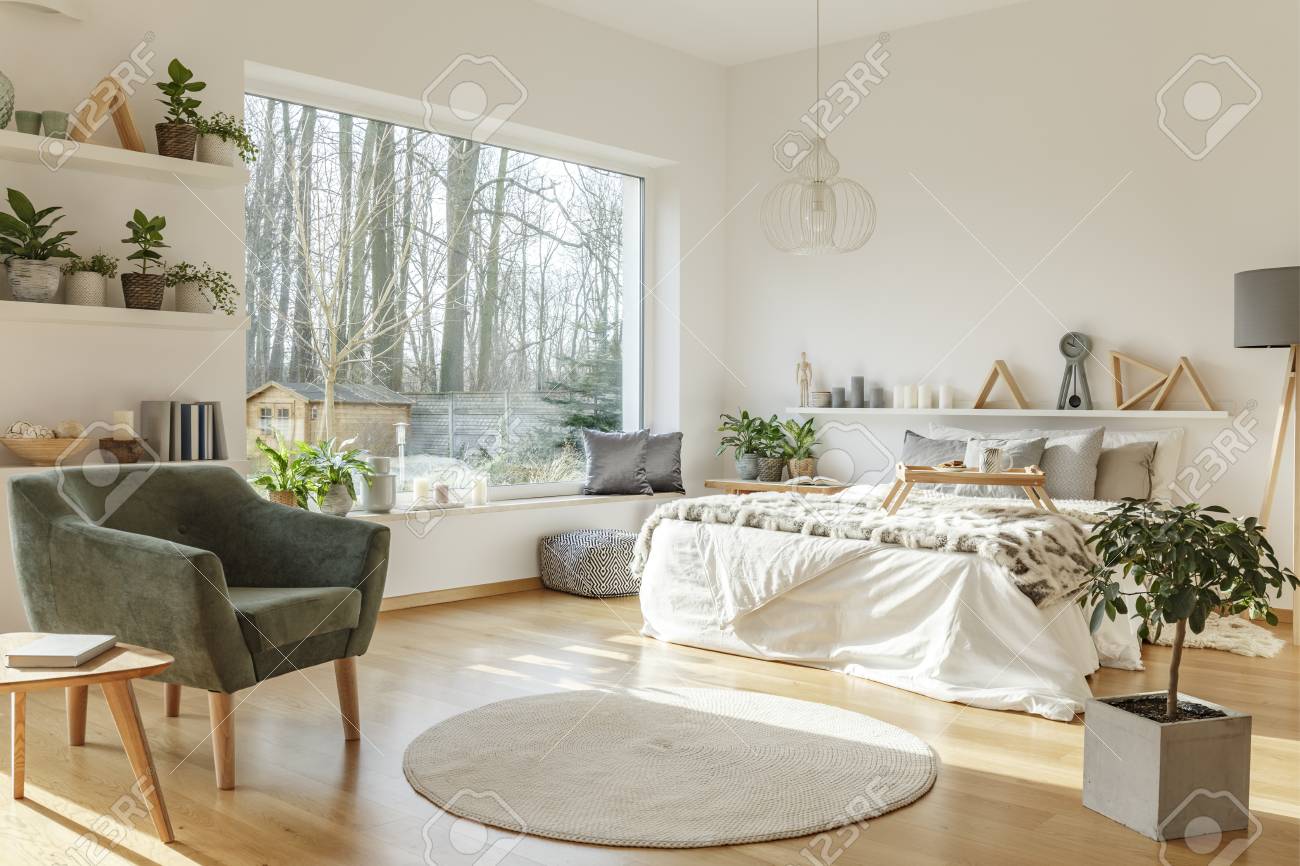 Cozy Hotel Room With A Nice View Outside Large Bed Armchair