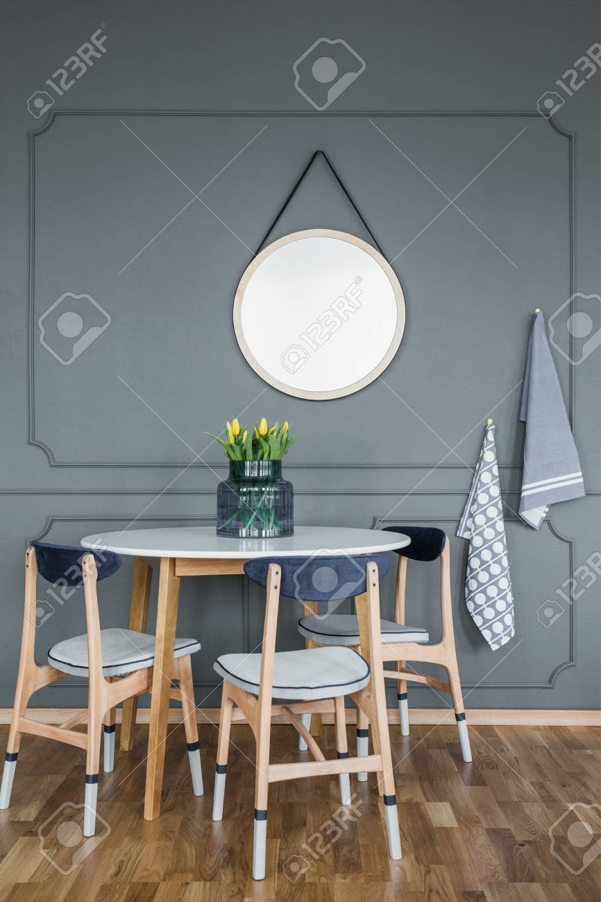 Mockup Of Round Mirror On Grey Wall Above Wooden Table And Chairs Stock Photo Picture And Royalty Free Image Image 102519778
