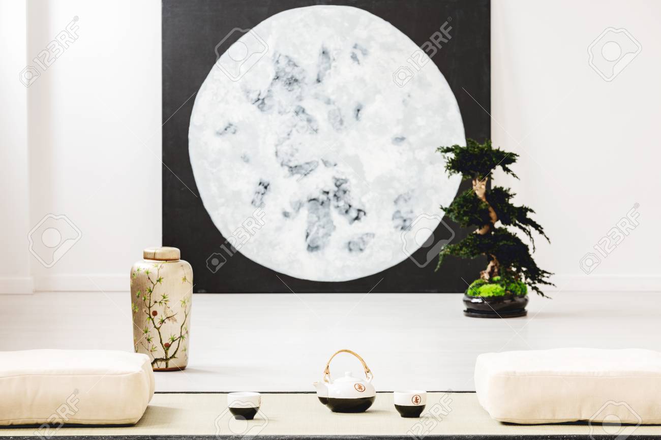 Moon Poster And Bonsai Between Pillows On The Floor In Japanese