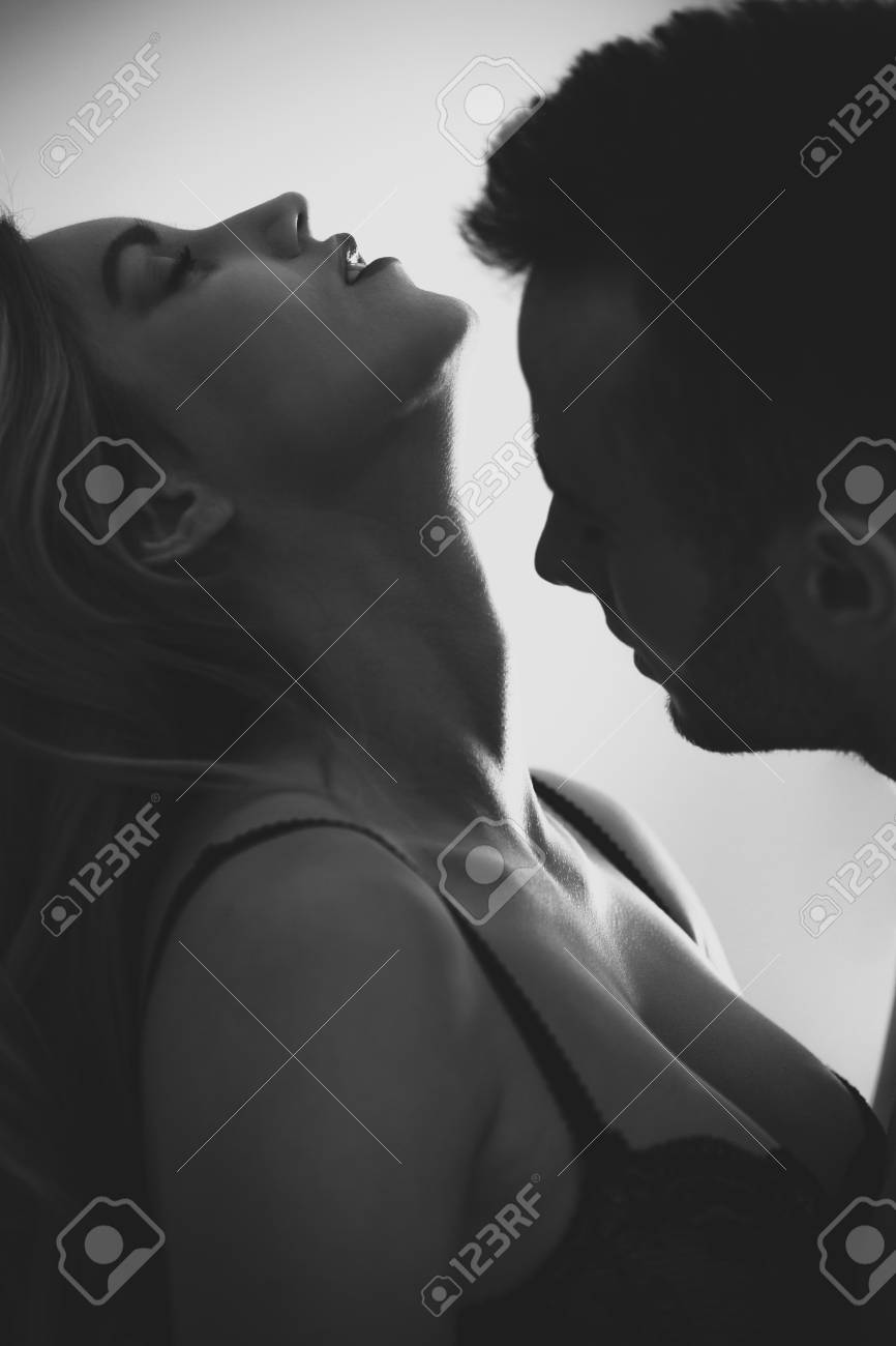 Attractive Sexy Couple During Foreplay. Black And White Photo Фотография,  картинки, изображения и сток-фотография без роялти. Image 107758873