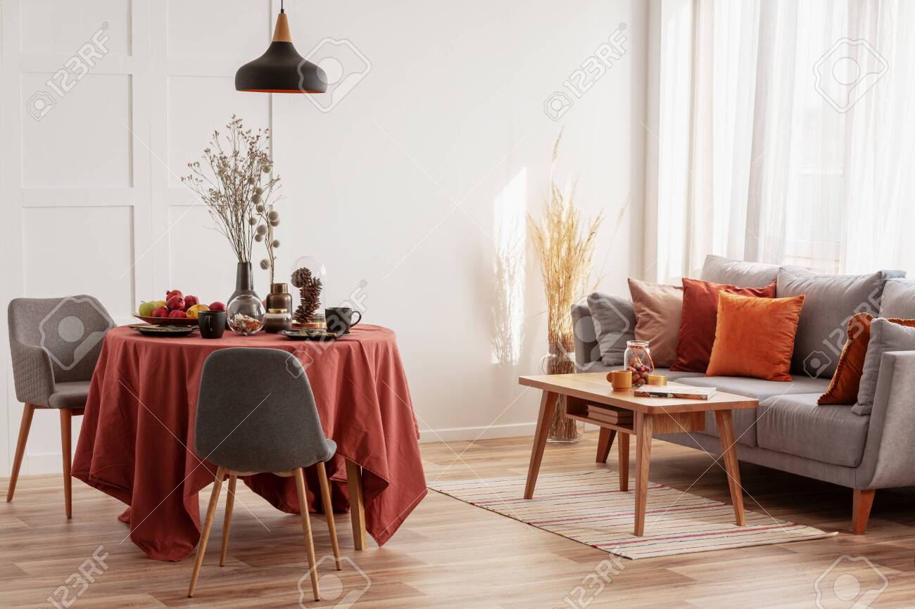 Living and dining room interior with grey, white and ginger design - 128074391 Living and dining room interior with grey, white and ginger design - 128074391