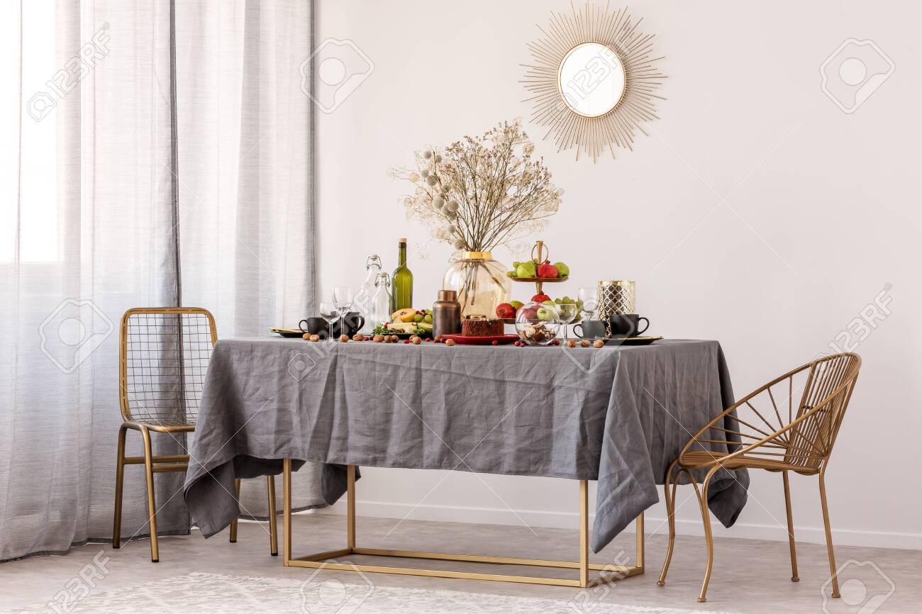Trendy Mirror In Golden Frame On White Wall Of Elegant Dining Stock Photo Picture And Royalty Free Image Image 128922723