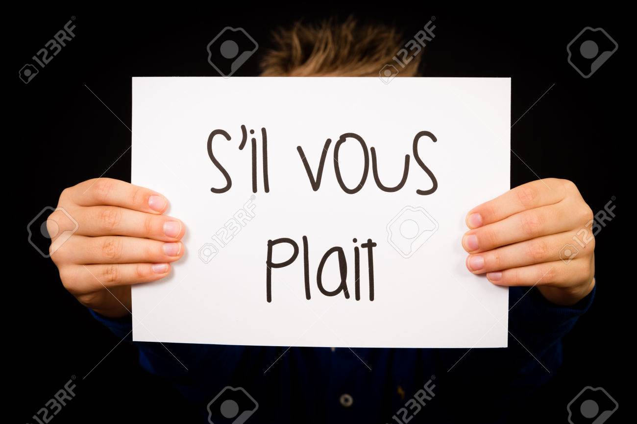 Studio Shot Of Child Holding A Sign With French Words S Il Vous Plait Please Stock Photo Picture And Royalty Free Image Image 36057638