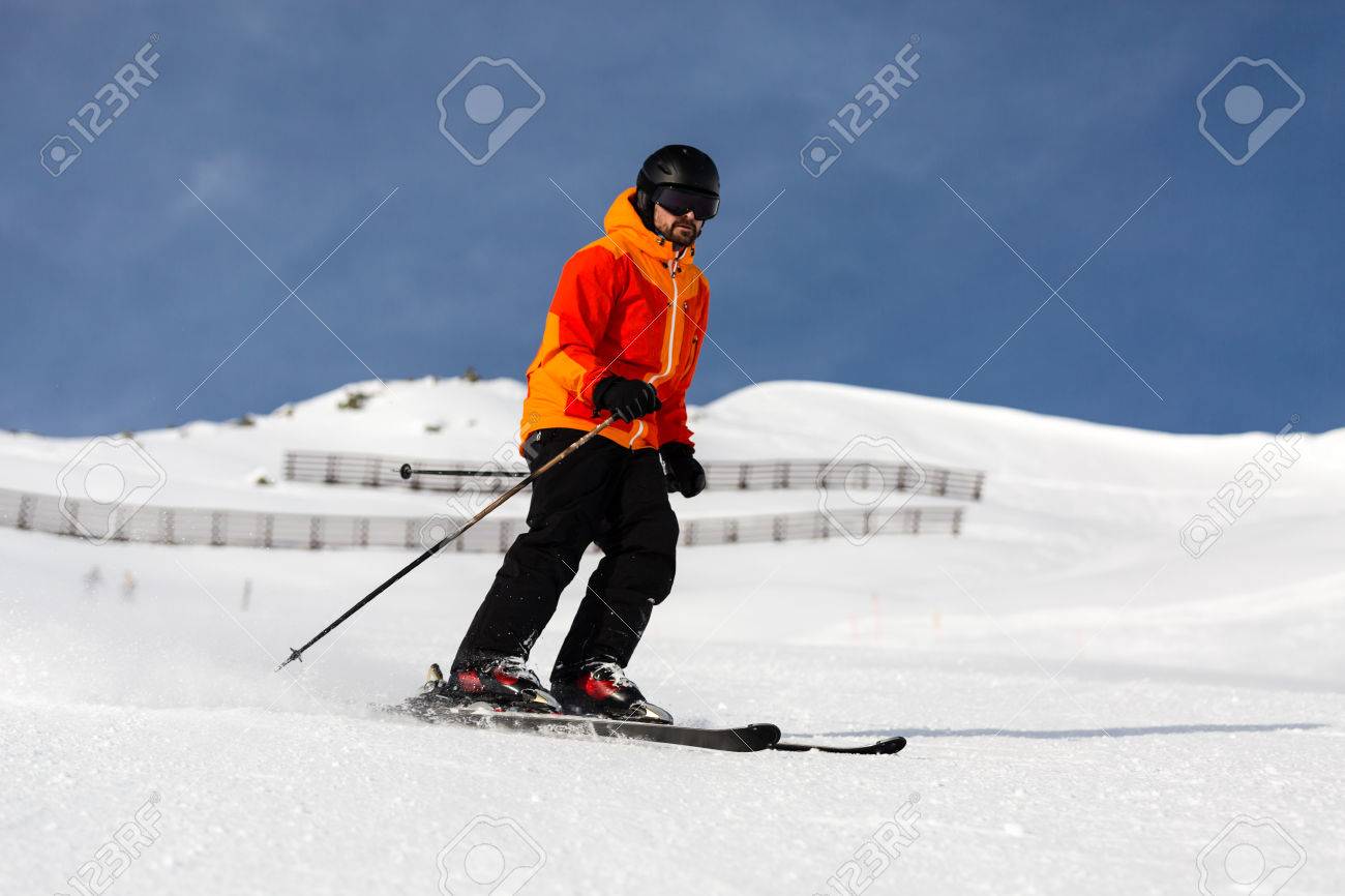orange ski suit