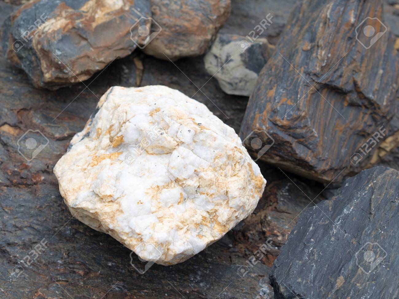White Stone With Orange Shades Between Others, Texture. Strange Lines And  Shades. Cloudy Weather. Summer, Mountain Altai Region. Stock Photo, Picture  and Royalty Free Image. Image 46183118.