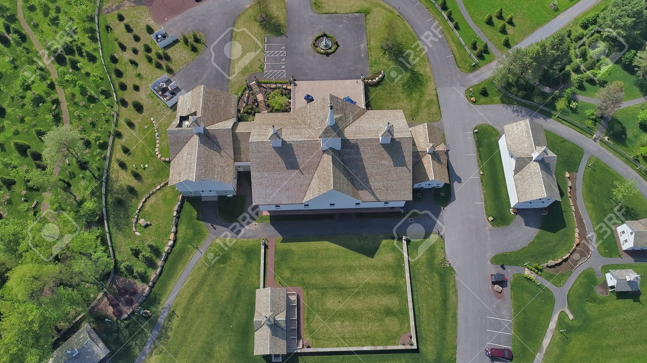 Late Afternoon Fall Aerial View of Beautiful Restored Barns and Countryside - 162658460 Late Afternoon Fall Aerial View of Beautiful Restored Barns and Countryside - 162658460