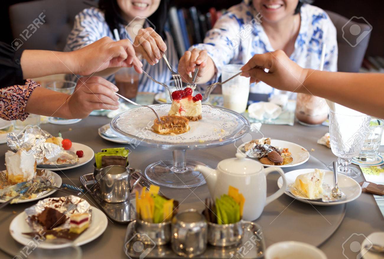 Mature friends having cake and drink on birthday in restaurant - 48390048 Mature friends having cake and drink on birthday in restaurant - 48390048