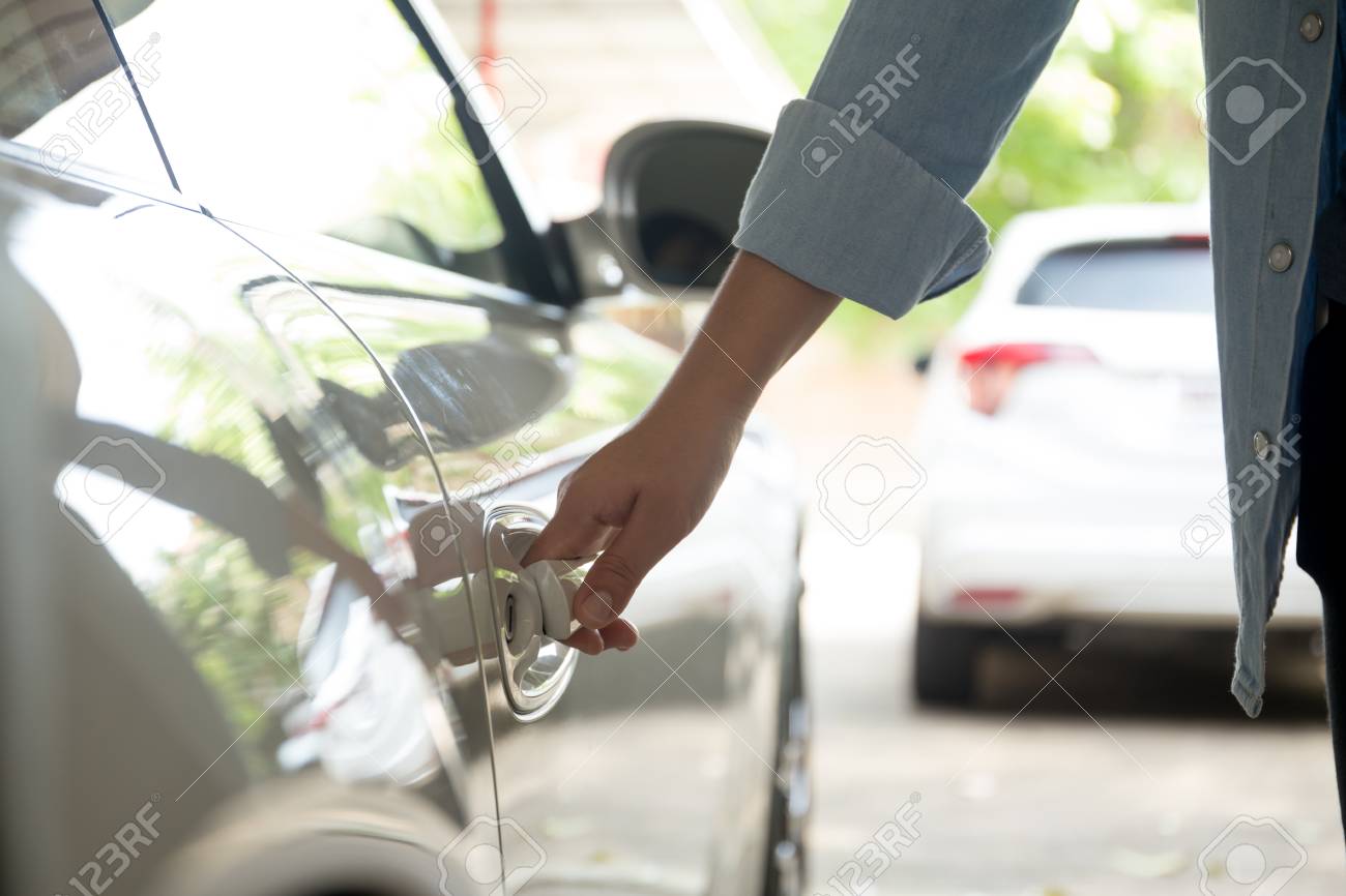 car door handle hand stock photo woman hand pulling car door handle to open the outdoors hand pulling car door handle to open the outdoors car door handle hand stock photo woman hand pulling car door handle to open the outdoors hand pulling car door handle to open the outdoors