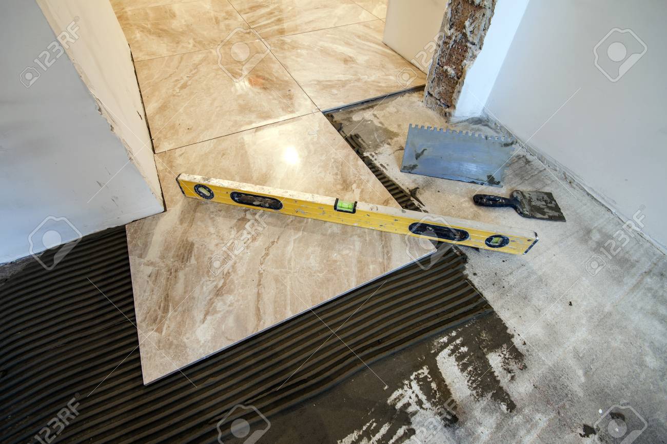 Ceramic Tiles And Tools For Tiler Floor Tiles Installation