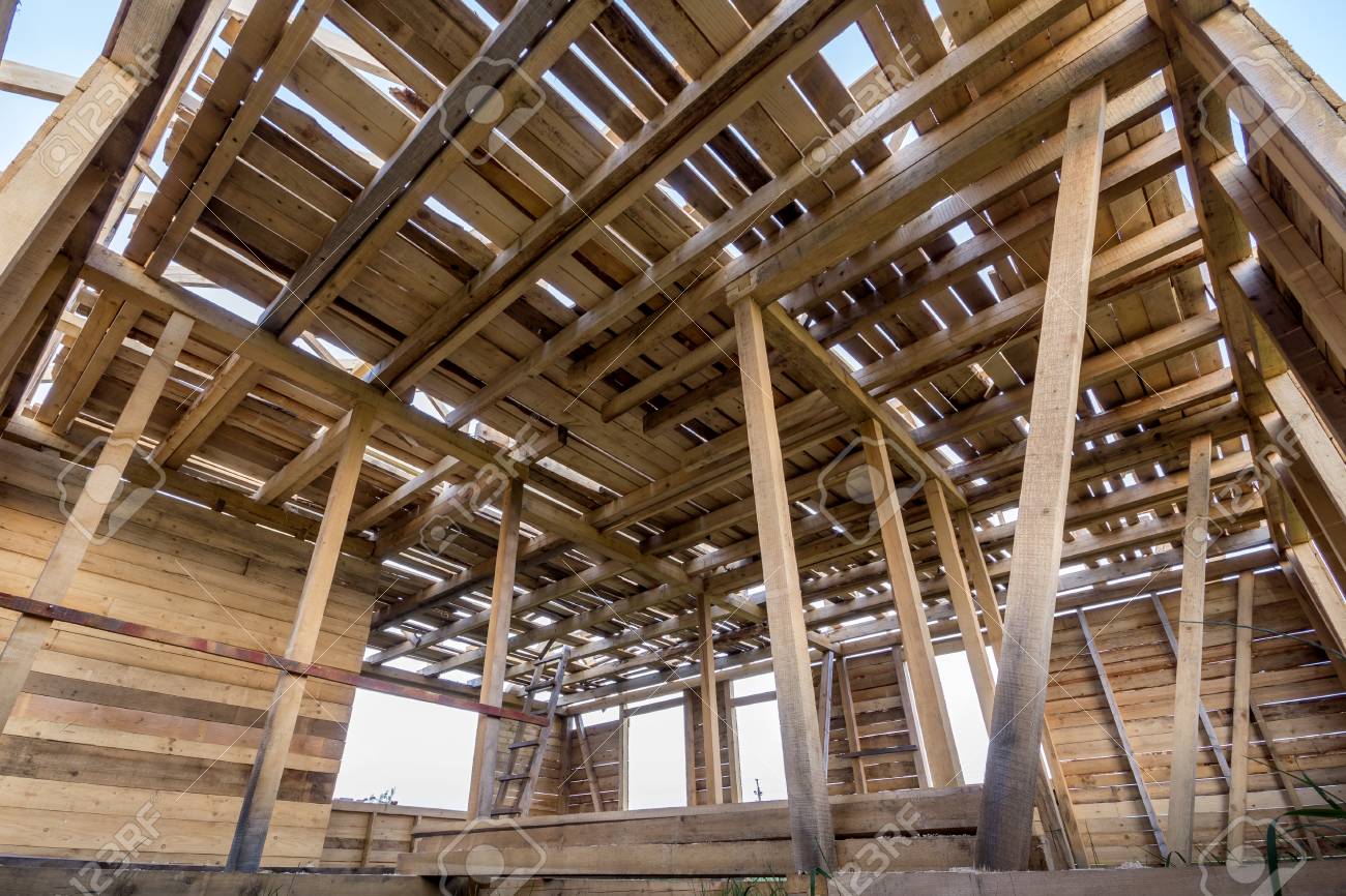 New Wooden House Under Construction Close Up Of Walls And Ceiling