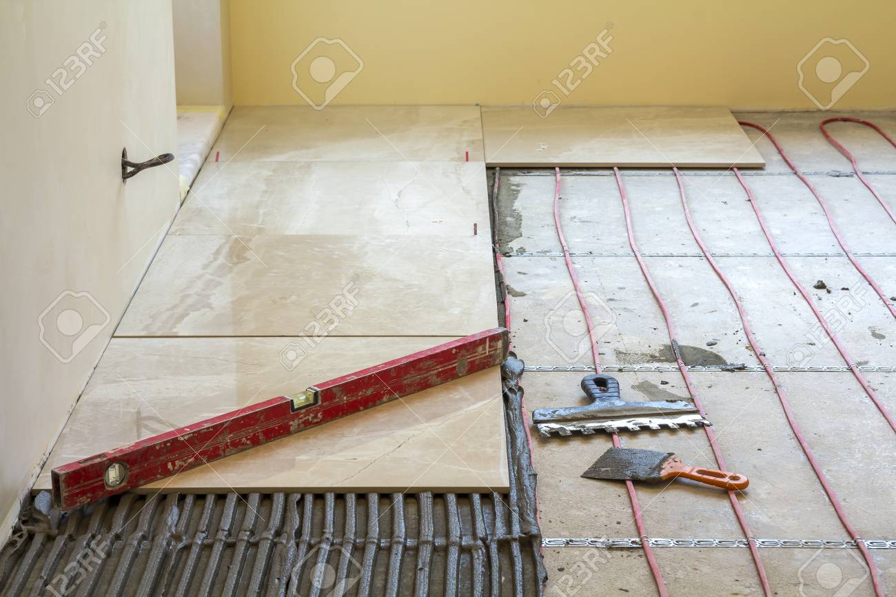 Close Up Of Lever On Ceramic Tiles On Cement Floor Tiles