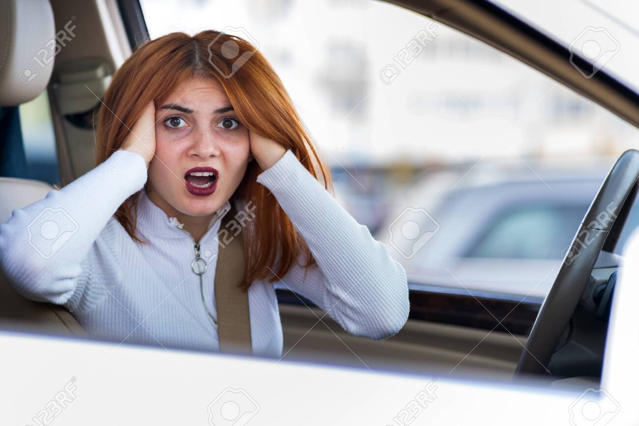 Closeup portrait of pissed off displeased angry aggressive woman driving a car shouting at someone. Negative human expression consept. - 136746830 Closeup portrait of pissed off displeased angry aggressive woman driving a car shouting at someone. Negative human expression consept. - 136746830