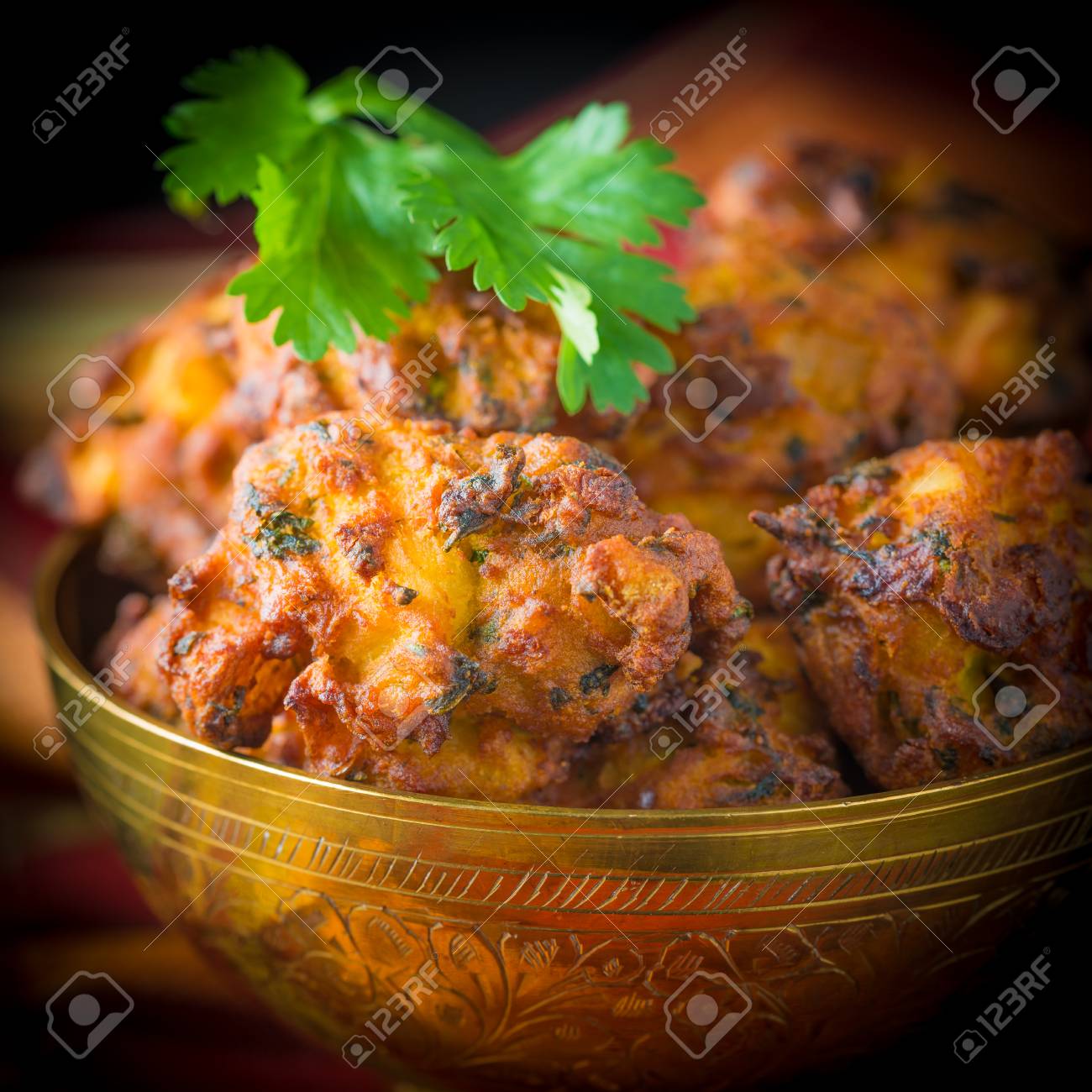 Pekoras Are Fried Vegetable Fritters Originating In India. Stock Photo,  Picture and Royalty Free Image. Image 68707083.