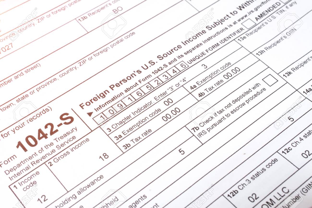 Tax Form 1042 Close Up, Individual Income Tax Return Form Horizontal Top  View Фотография, картинки, изображения и сток-фотография без роялти. Image  105065647