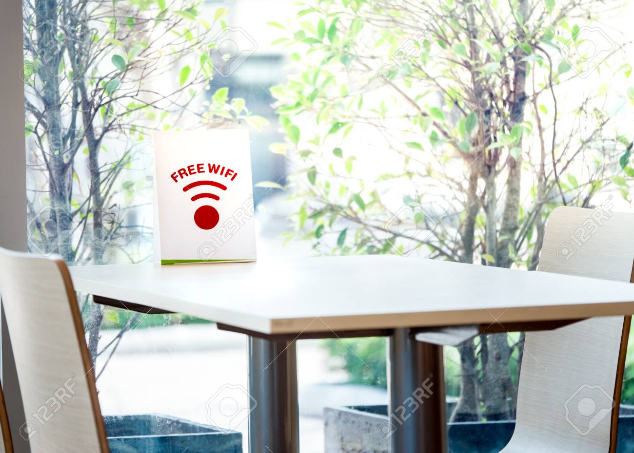 Free Wifi Sign Label For Customer On The Table In The Fastfood Restaurant Stock Photo Picture And Royalty Free Image Image 84989360