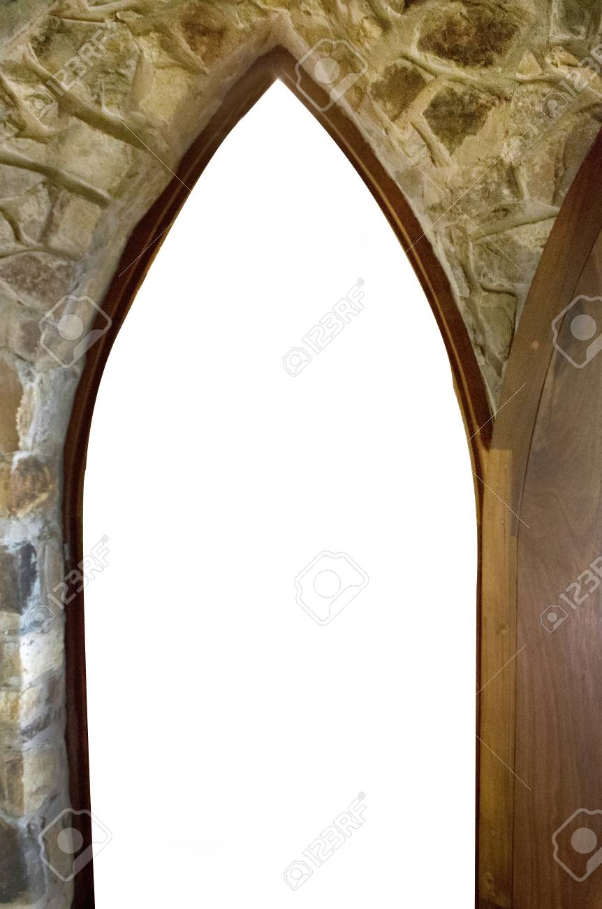 Arch Doorway Showing Decorative Bricks And A Portion Of A Door
