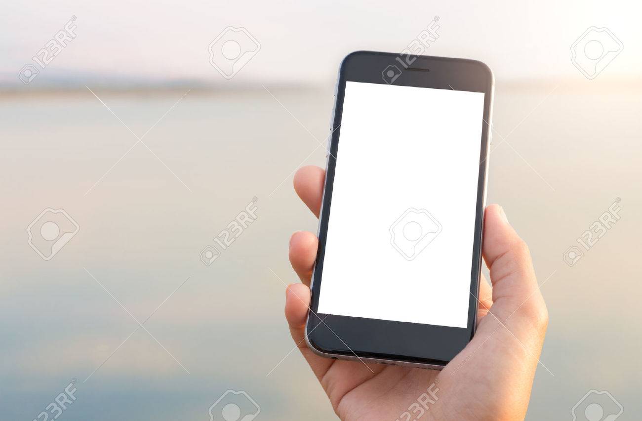 hand holing phone white screen at outdoor lifestyle - 56530820 hand holing phone white screen at outdoor lifestyle - 56530820