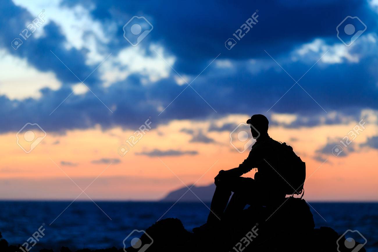 Hiking or running silhouette backpacker, man looking at ... Looking for inspirational images