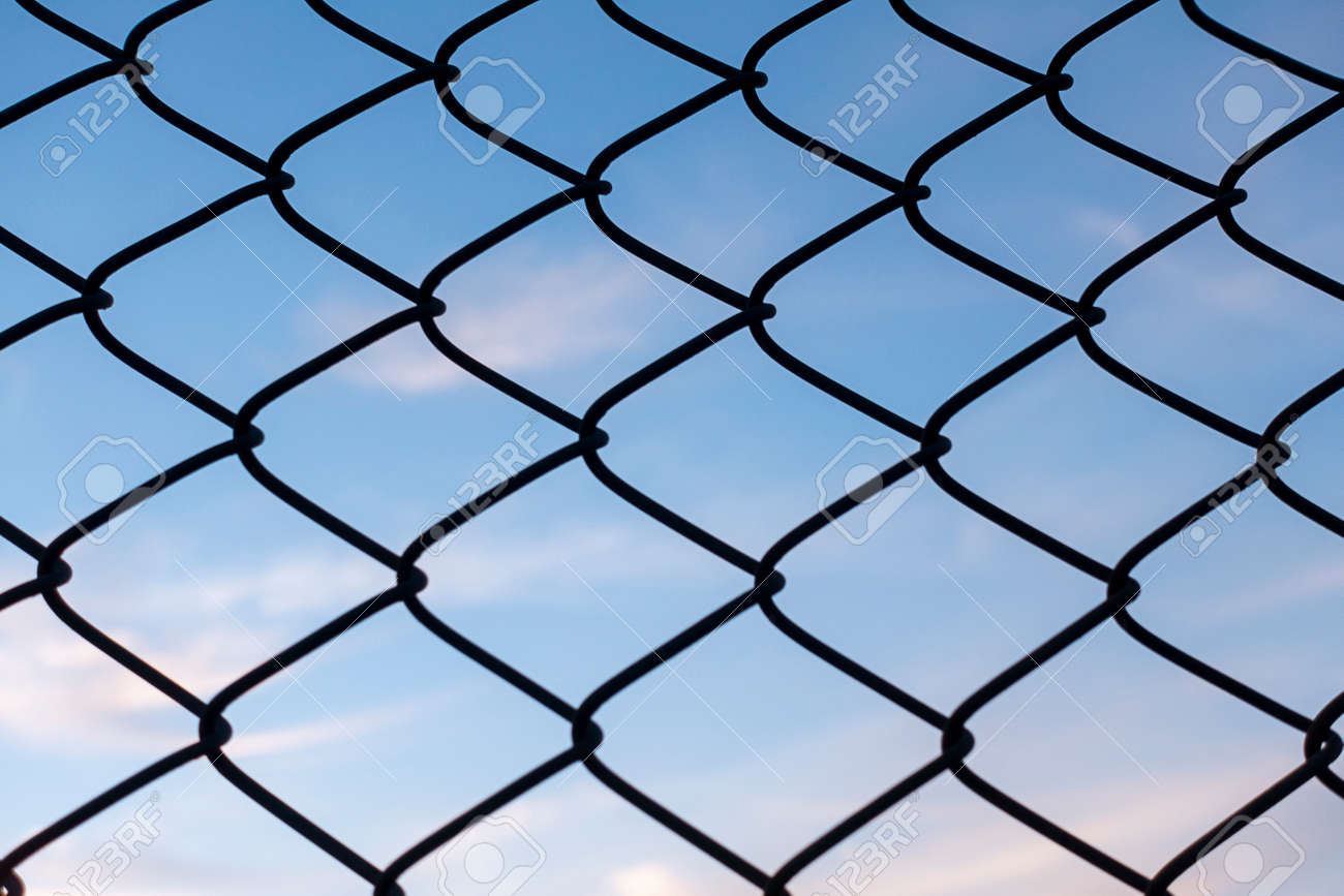 blue sky and wire fences - 164569611 blue sky and wire fences - 164569611