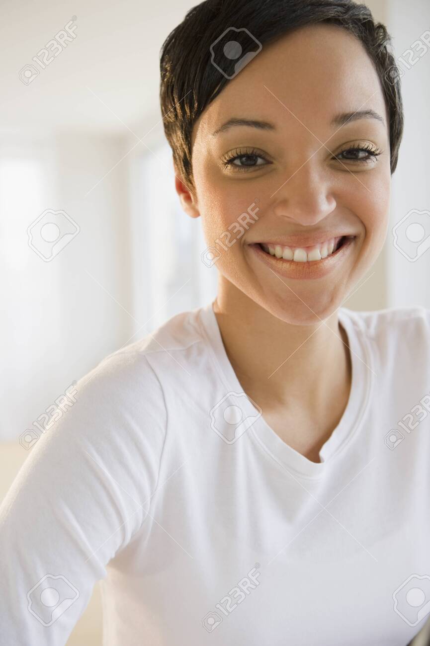 Mixed Race Woman With Short Hair Smiling Stock Photo Picture And