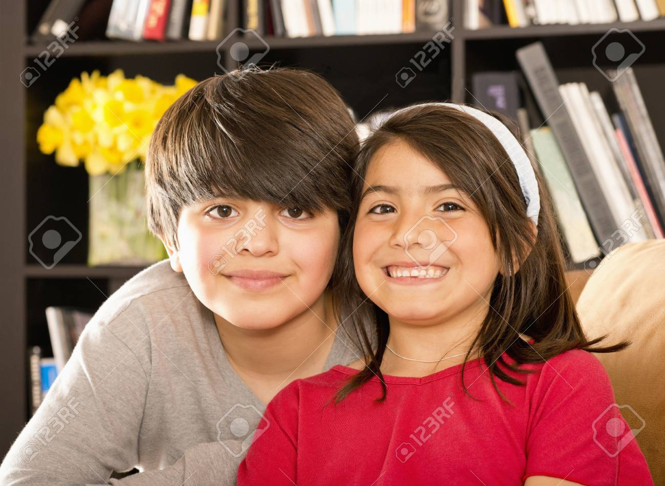 Foto De Archivo Smiling Hispanic Brother And Sister Foto De Archivo Smiling Hispanic Brother And Sister