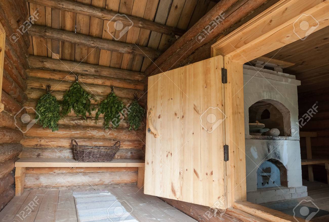Birch brooms for a steam room in traditional russian wooden bath - 31566888 Birch brooms for a steam room in traditional russian wooden bath - 31566888