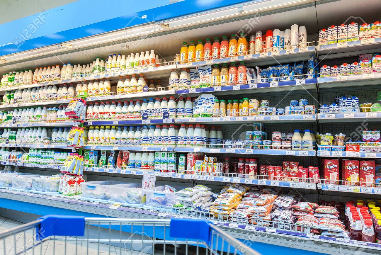 SAMARA, RUSSIA - FEBRUARY 7, 2015: Fresh milk produces ready for sale in Perekrestok Samara Store. Perekrestok is a Russian supermarket chain operated by X5 Retail Group - 36397312 SAMARA, RUSSIA - FEBRUARY 7, 2015: Fresh milk produces ready for sale in Perekrestok Samara Store. Perekrestok is a Russian supermarket chain operated by X5 Retail Group - 36397312