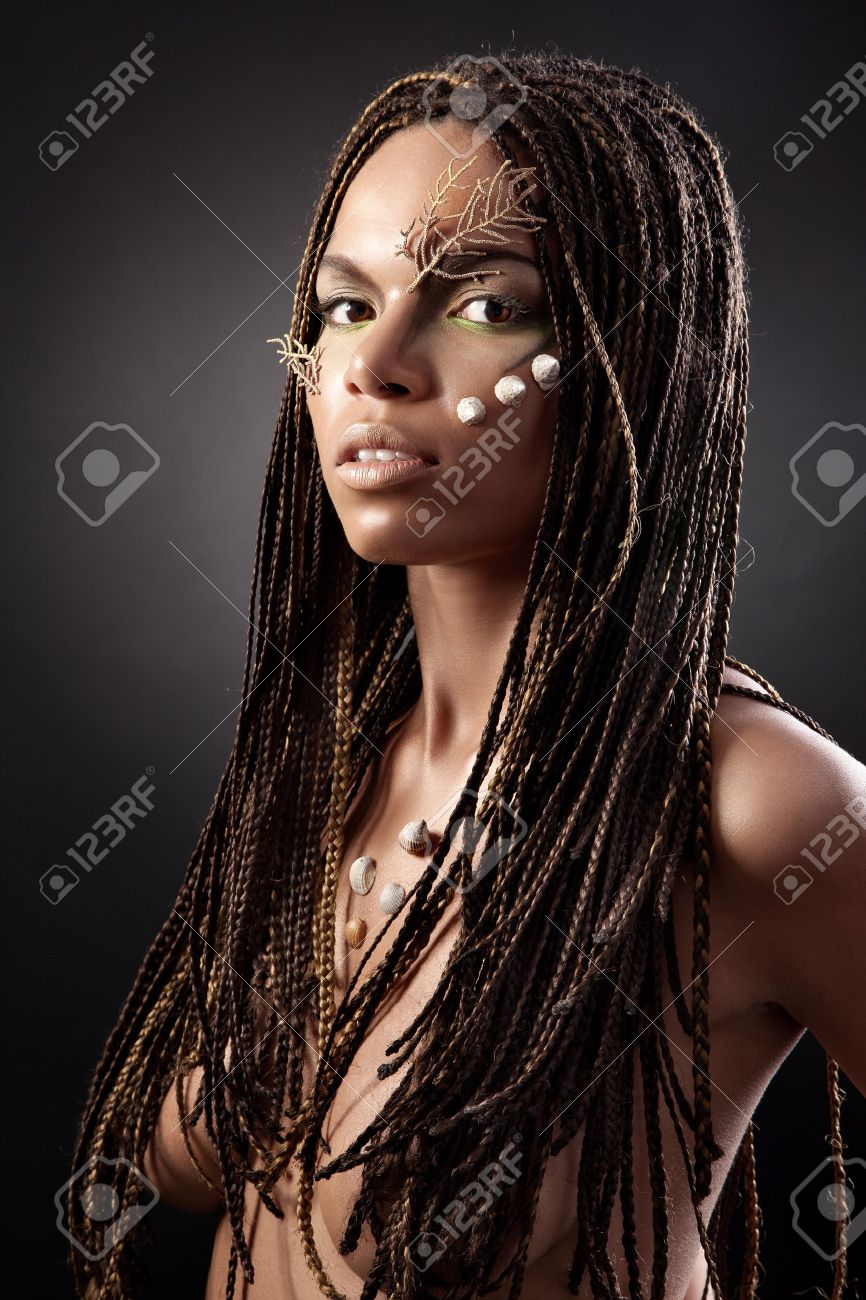 Naked Ebony Dreadlocks - Portrait of a beautiful nude young african american woman with..