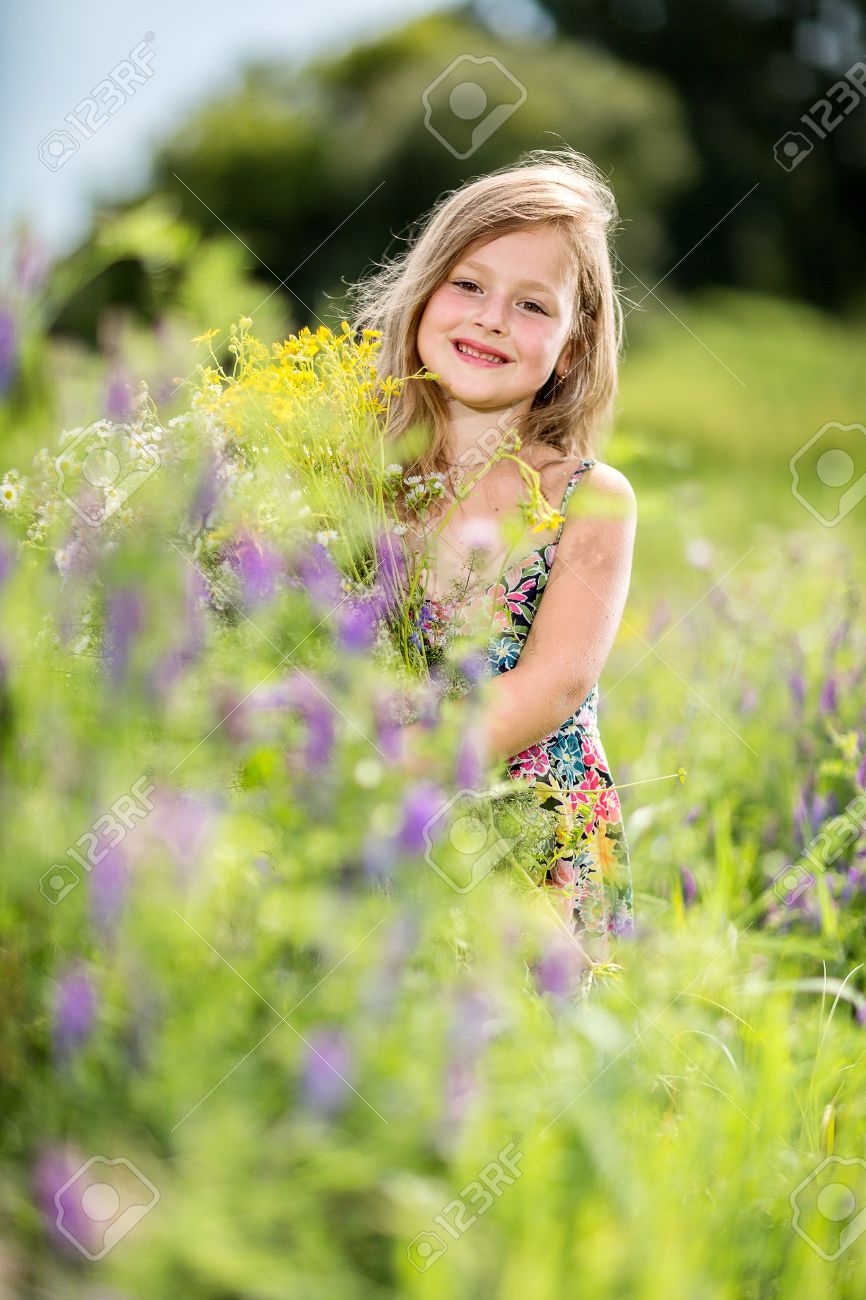 baby girl with flowers