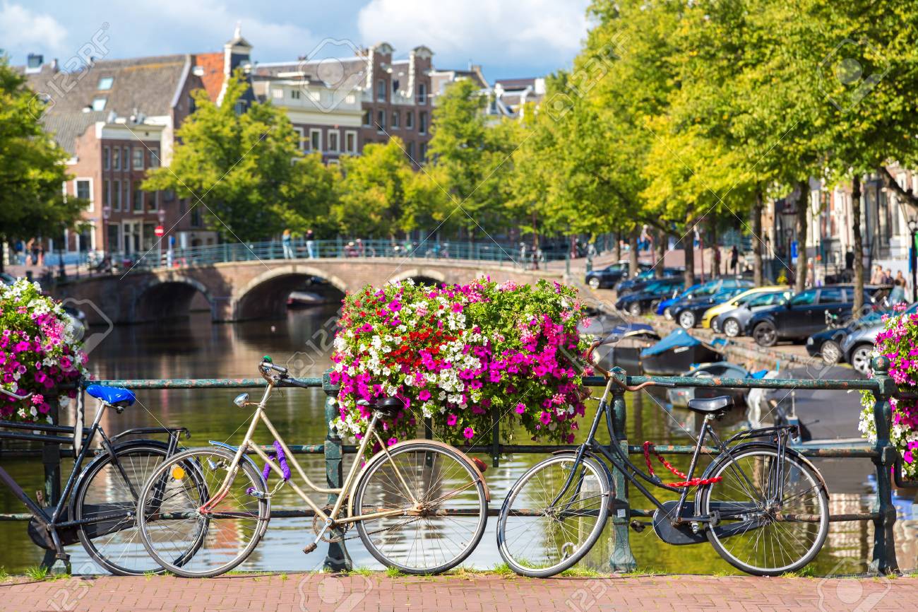 Bicycles On A Bridge Over The Canals Of Amsterdam Amsterdam Stock Photo Picture And Royalty Free Image Image
