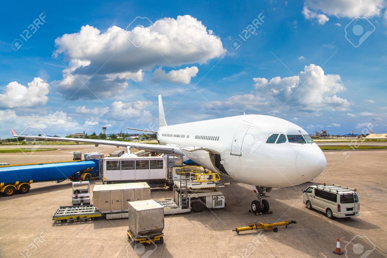 Airplane ready to take off at Velana International Airport in Male, Maldives in a summer day - 108051603 Airplane ready to take off at Velana International Airport in Male, Maldives in a summer day - 108051603