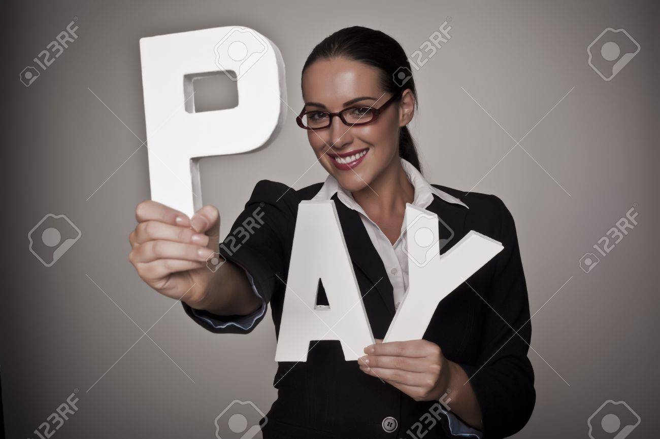 A income concept image of a woman holding letters that spell out the word pay demonstrating fare pay for woman - 16547616 A income concept image of a woman holding letters that spell out the word pay demonstrating fare pay for woman - 16547616