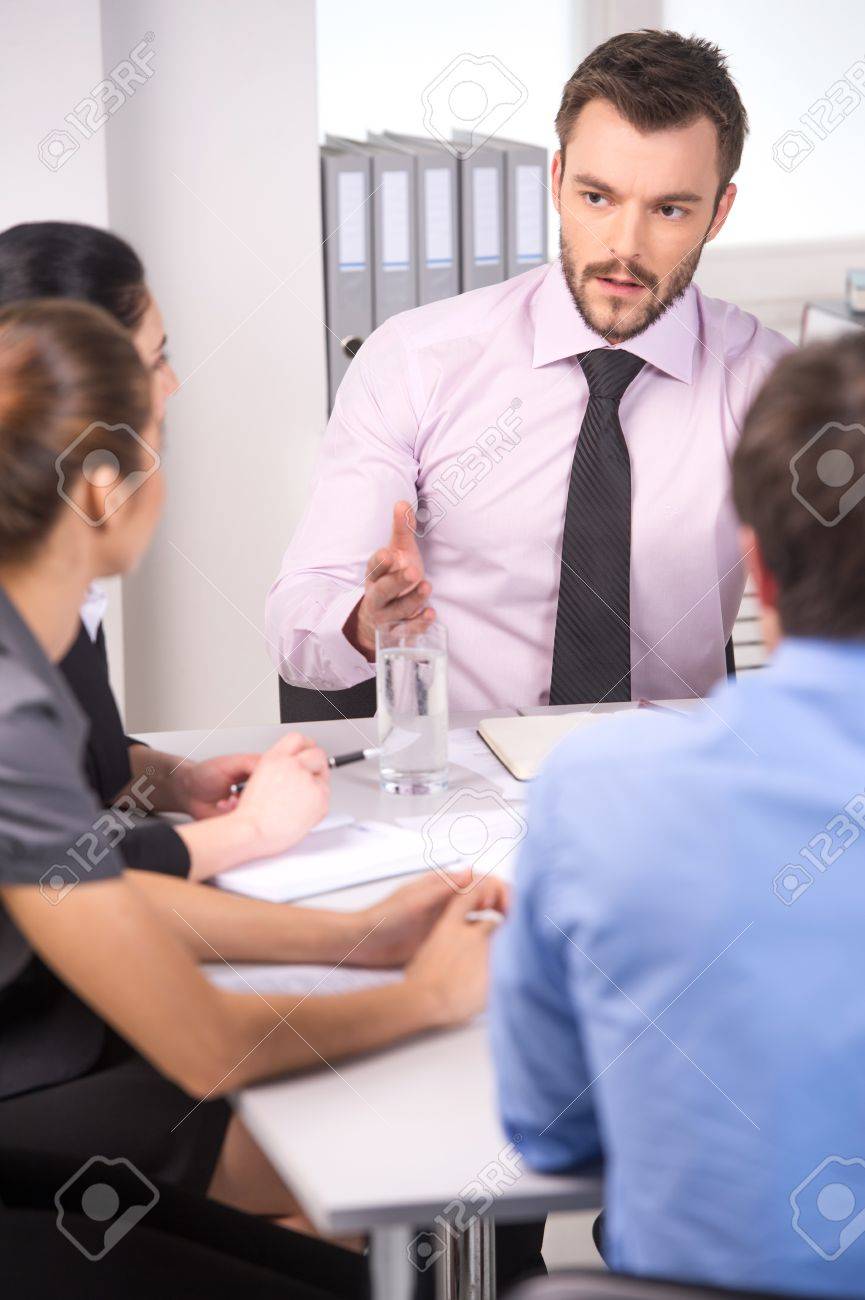 Group of young business people talking on business meeting. business man and woman working on meeting in office - 33247618 Group of young business people talking on business meeting. business man and woman working on meeting in office - 33247618