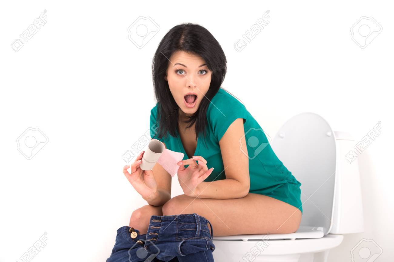 Beautiful Brunette Girl Sitting On Toilet Seat. Upset And Shocked Woman  Holding Toilet Roll Without Paper Stock Photo, Picture and Royalty Free  Image. Image 33484813., image size:1300x865