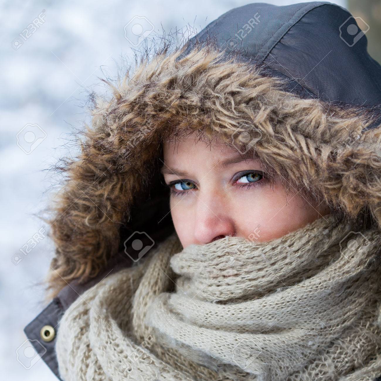 Woman Dressed In Winter Clothes With A 