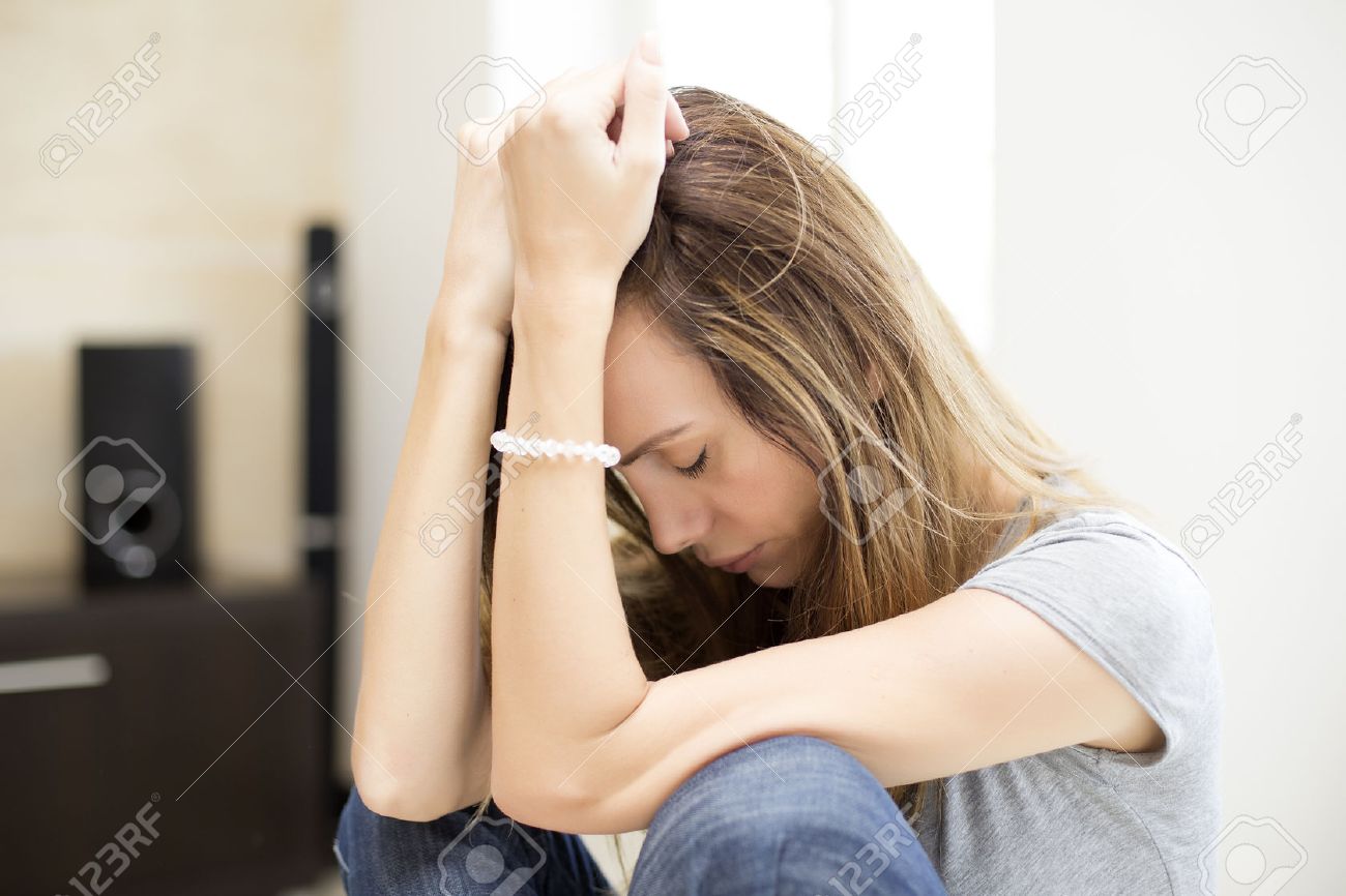 Sad Woman In The Room Stock Photo, Picture And Royalty Free Image ...