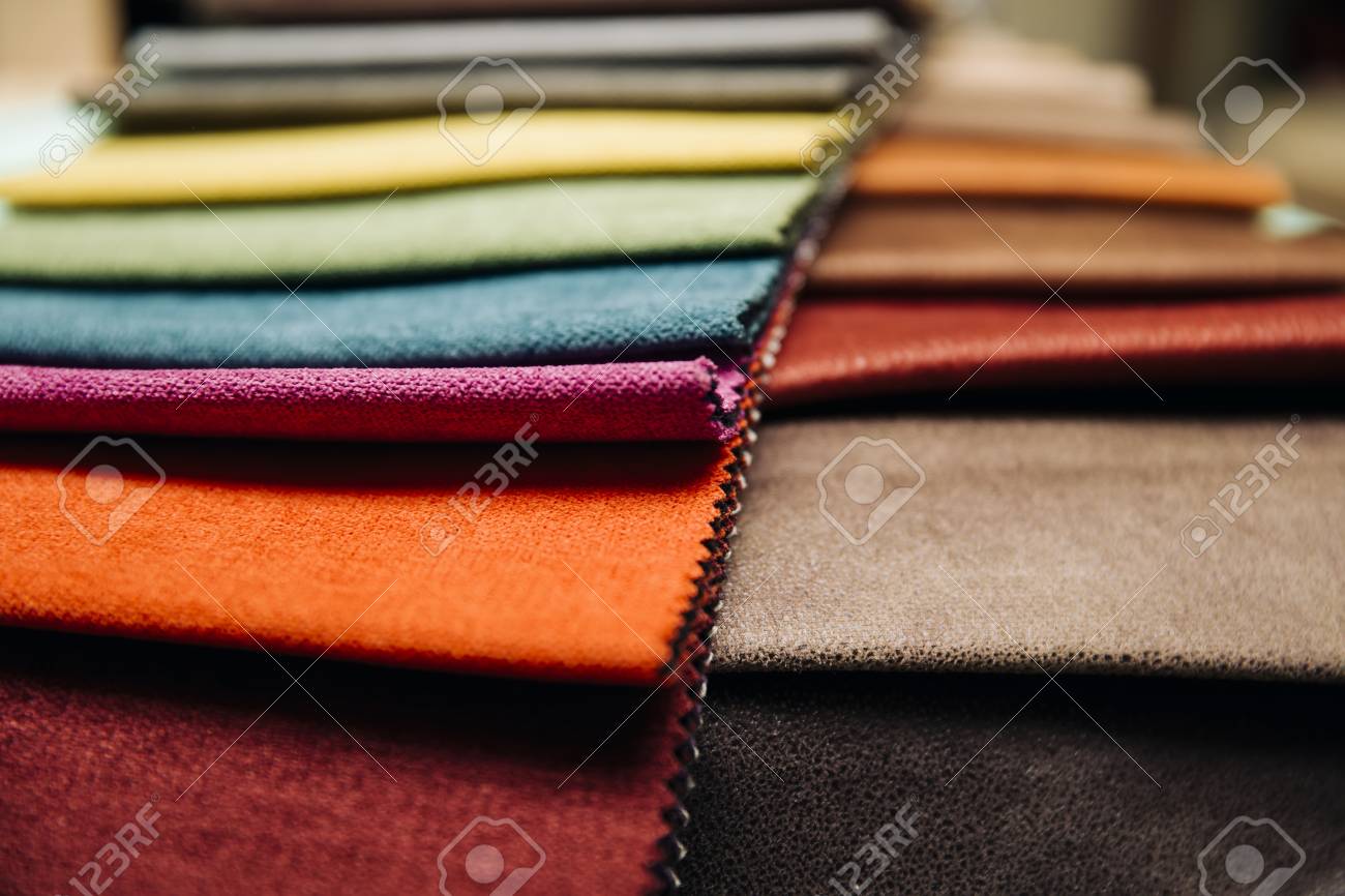 Closeup of the colorful furniture covers in the upholstery workshop - 101821467 Closeup of the colorful furniture covers in the upholstery workshop - 101821467