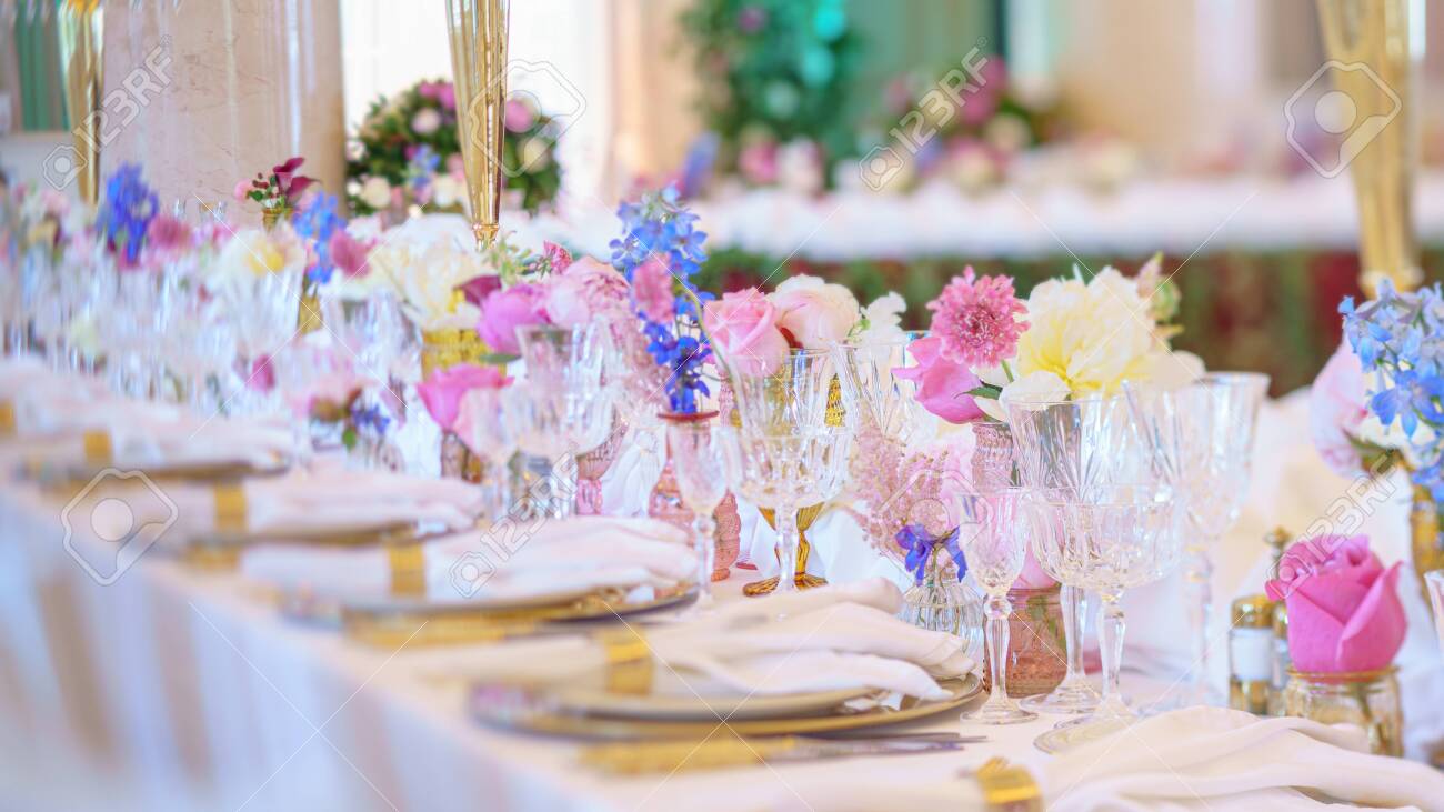 Catering table set service with silverware, napkin and glass at restaurant before party - 130904059 Catering table set service with silverware, napkin and glass at restaurant before party - 130904059