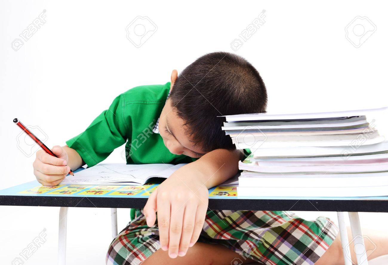 Student boy sleep while doing homework - 22170319 Student boy sleep while doing homework - 22170319