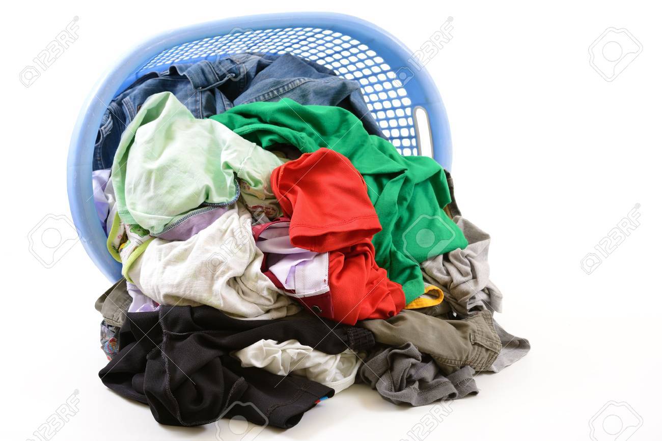 Clothes in a laundry basket isolated on white background - 22187326 Clothes in a laundry basket isolated on white background - 22187326