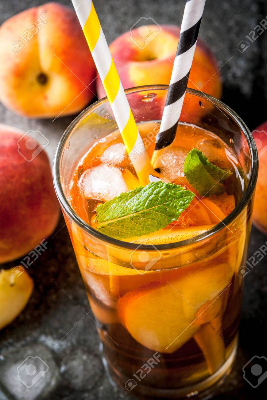 summer refreshment drinks iced tea with pieces of organic home made