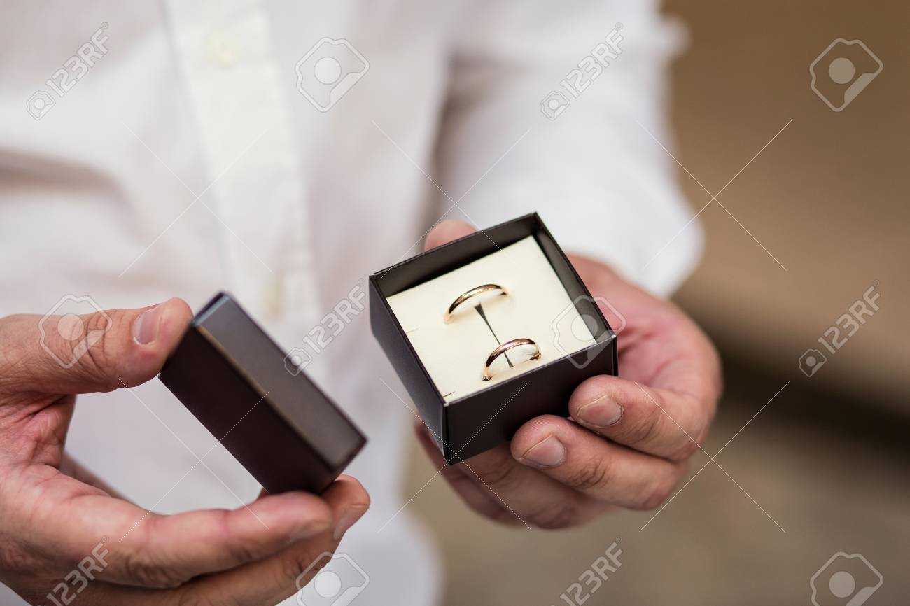 Groom Holding Wedding Rings Wedding Rings Lie In The Classic
