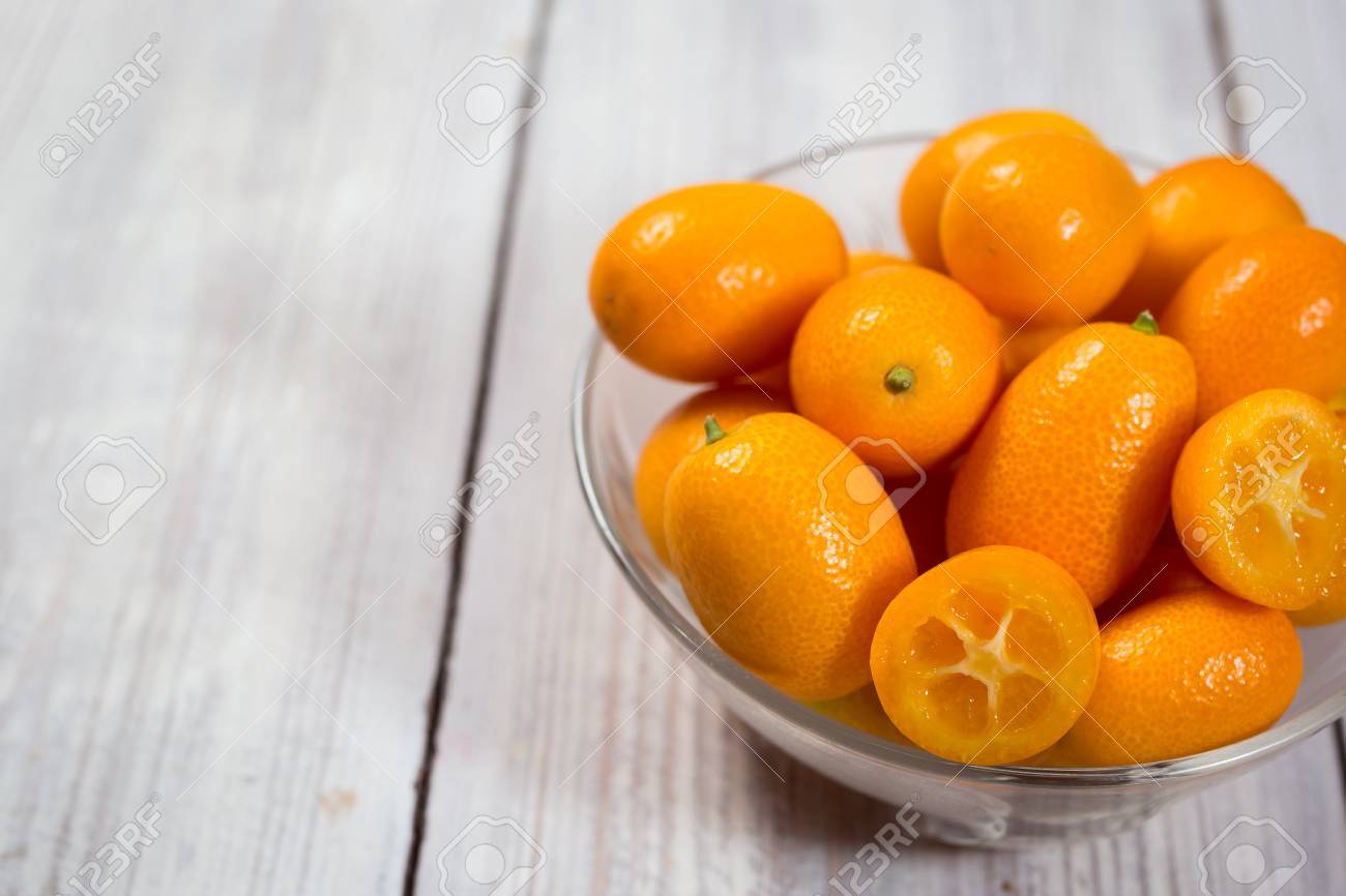 74631628-kumquat-in-a-plate-raw-organic-