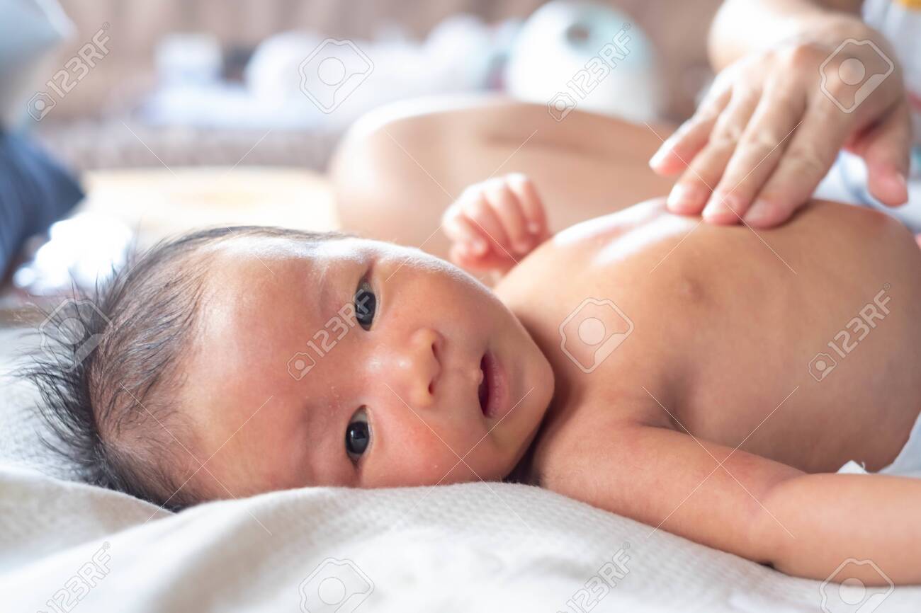 Close Up Hands Of Mother Touching And Take Care Newborn Infant Stock Photo Picture And Royalty Free Image Image 147557949