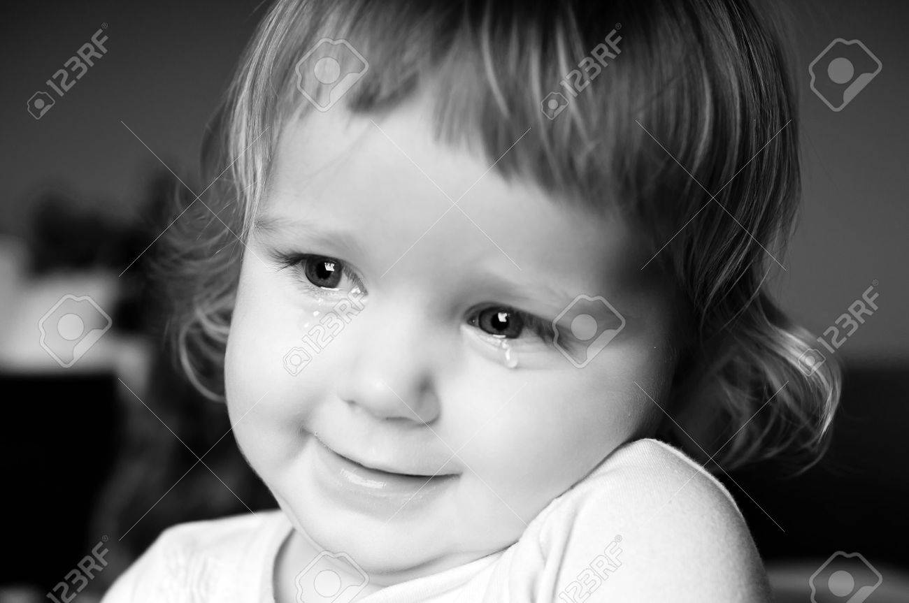 Crying little girl with focus on her tears - 11567377 Crying little girl with focus on her tears - 11567377