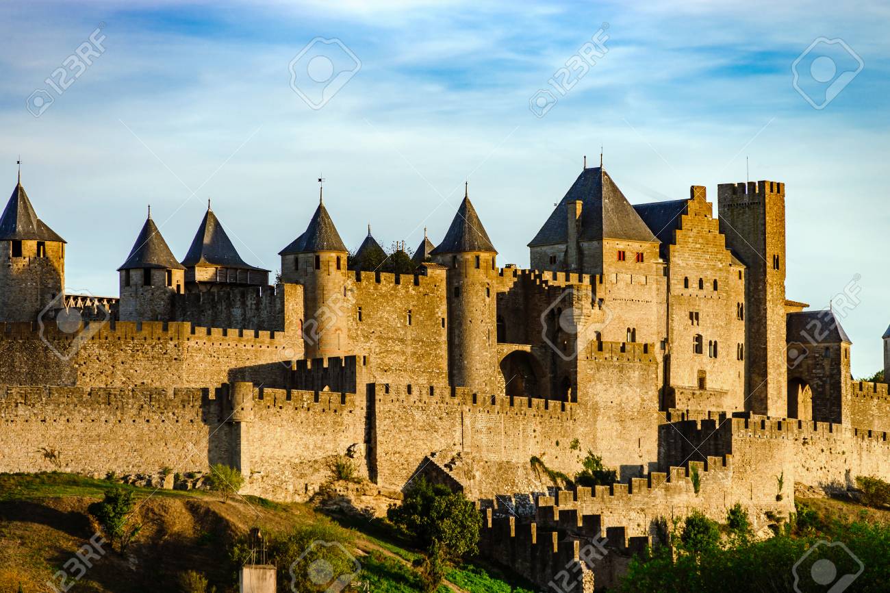 Carcassonne medieval fortress sunset view, warm light, France - 93875310 Carcassonne medieval fortress sunset view, warm light, France - 93875310
