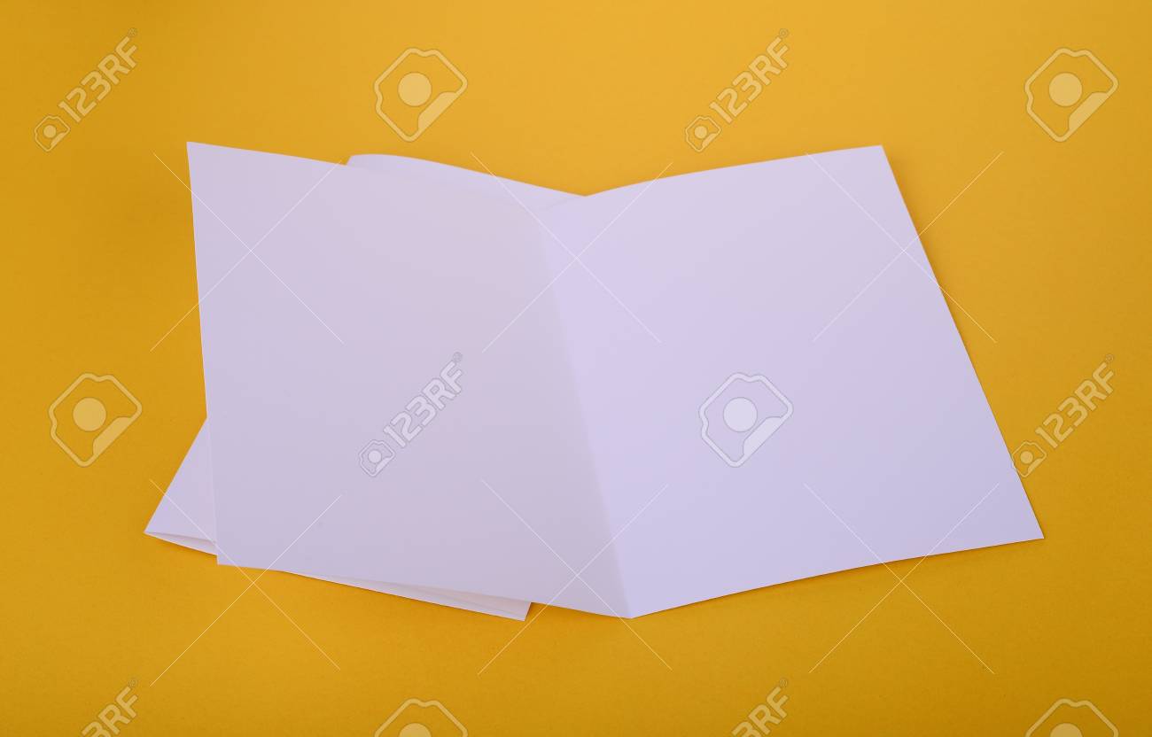 Download Two White Paper Bifold Brochure Mockup On Yellow Background Stock Photo Picture And Royalty Free Image Image 64848115 PSD Mockup Templates