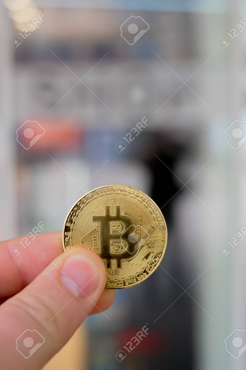 Bitcoin Payment In A Shop Or Store Using Cryptocurrency In Real Life  Concept Stock Photo, Picture and Royalty Free Image. Image 96159713.